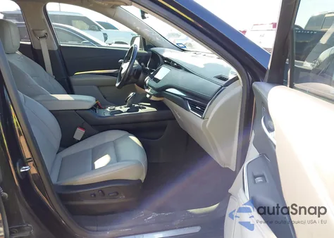 2023 Cadillac Xt4 Fwd Luxury from USA, damaged, VIN 1GYAZAR4XPF120184